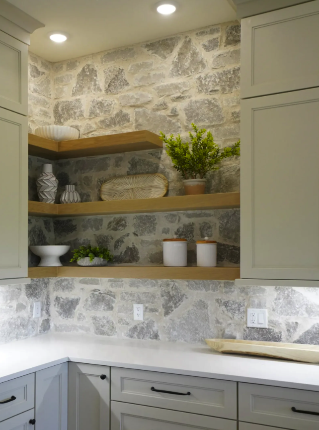 Fond du Lac mosaic backs open kitchen shelving, its angular pieces running behind the counter.