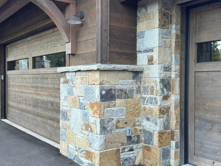 Aspen Estate veneer and Silver Mountain wainscot caps on a facade.