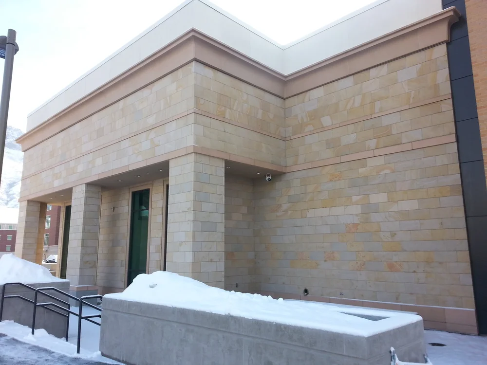 Mountain Valley panel veneer in a honed face across a facade.