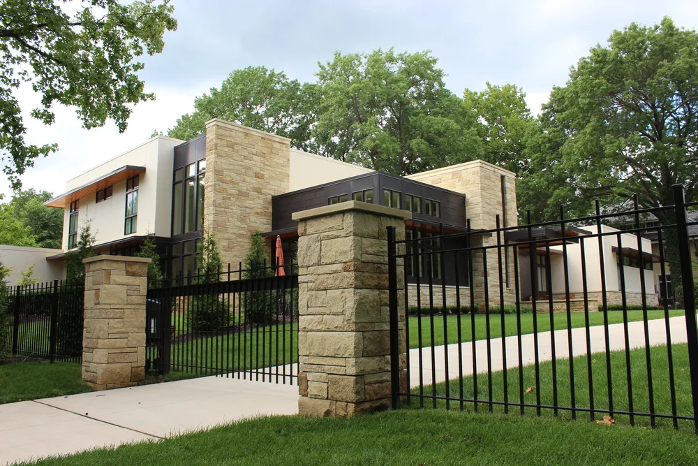 Prairie Shell split-face ashlar veneer topped with honed wall caps.
