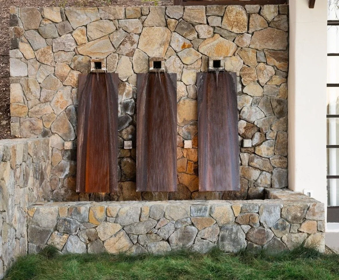 Yountville mosaic veneer in split and natural faces across a wall.