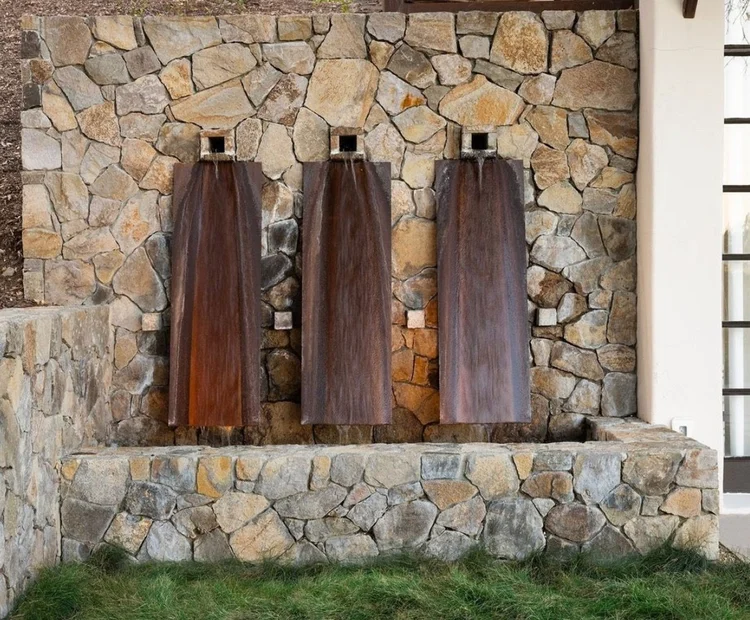 Yountville mosaic veneer in split and natural faces across a wall.