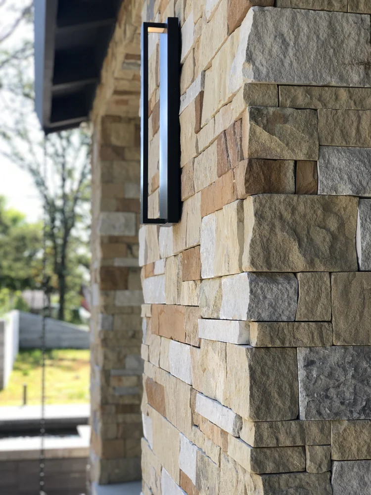 Split and natural Napa Valley Estate ashlar veneer with dry-stack joints on a home facade.