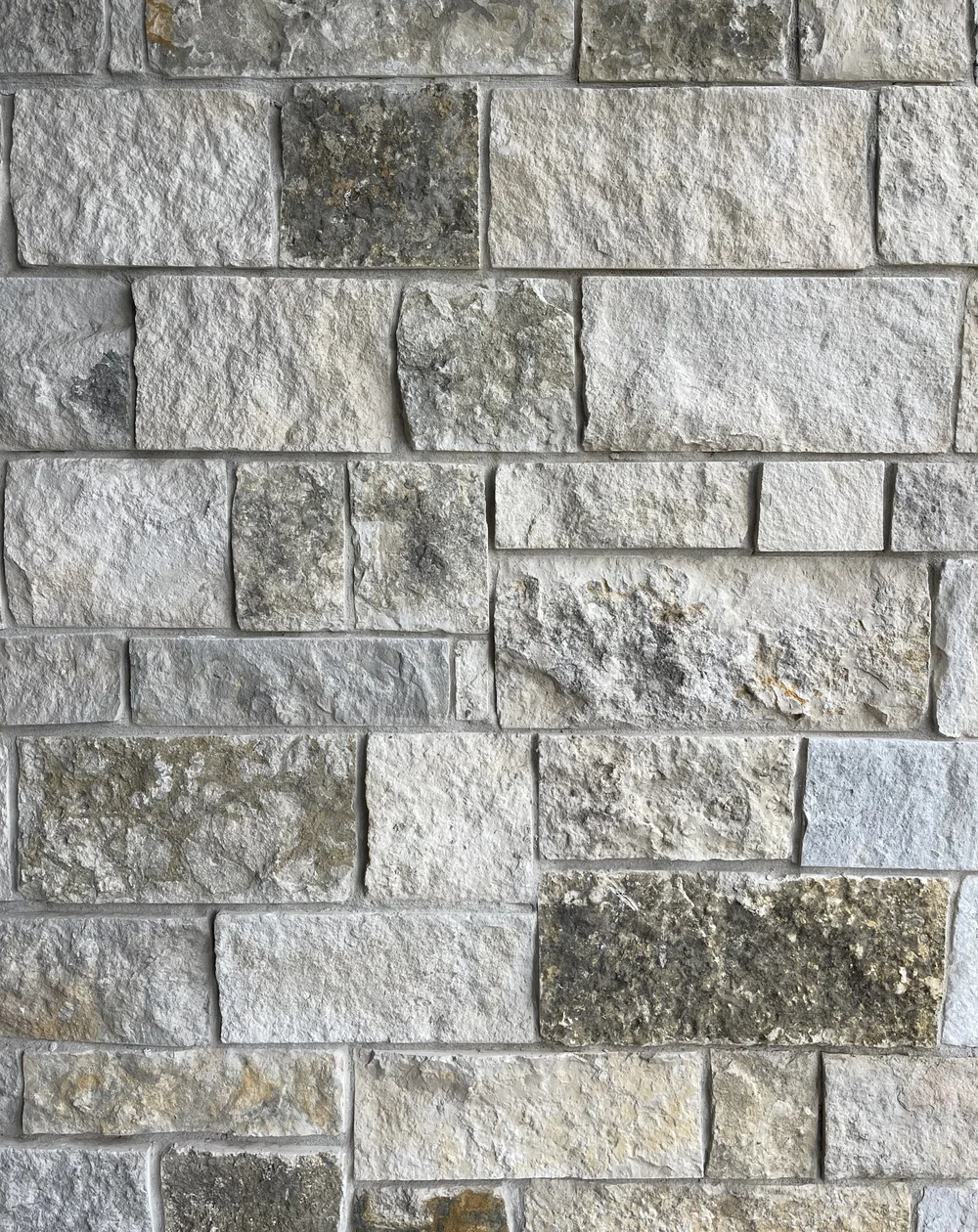 Oceanside Estate ashlar veneer swatch showing split and natural faces.