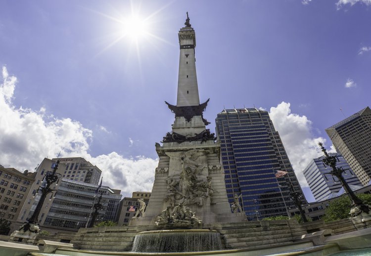 Honed-faced Indiana Limestone monument on a water feature.