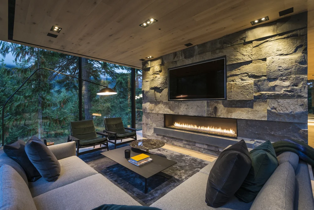 Whistler Basalt panel veneer in a natural face with dry-stack joints on an interior fireplace.
