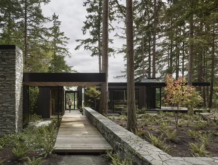 Whistler Basalt ledgestone veneer in a natural face with dry-stack joints across a facade and entry.
