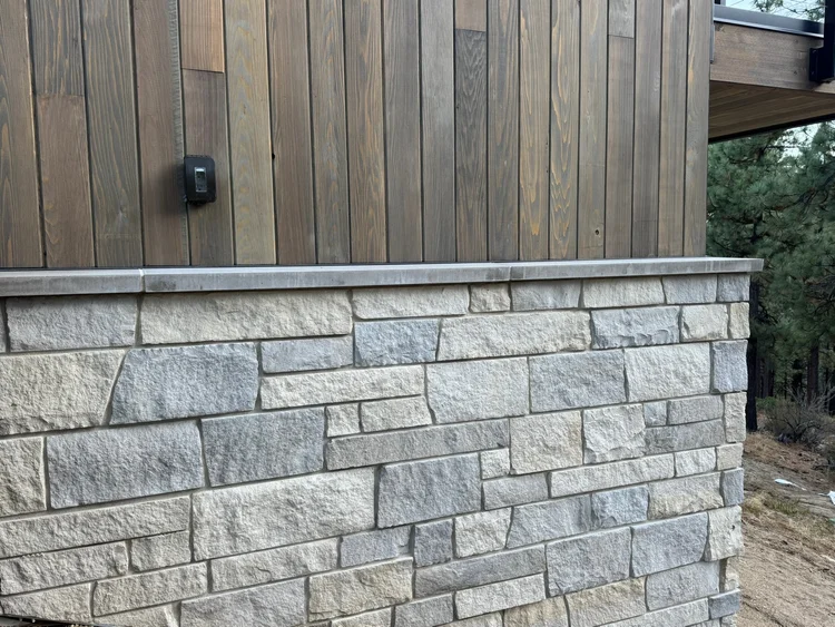 Bellevue Estate veneer and Charcoal wainscot caps on a facade.