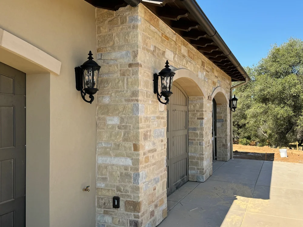 Napa Valley Estate ashlar veneer in split and natural faces with overgrout joints on a home facade.