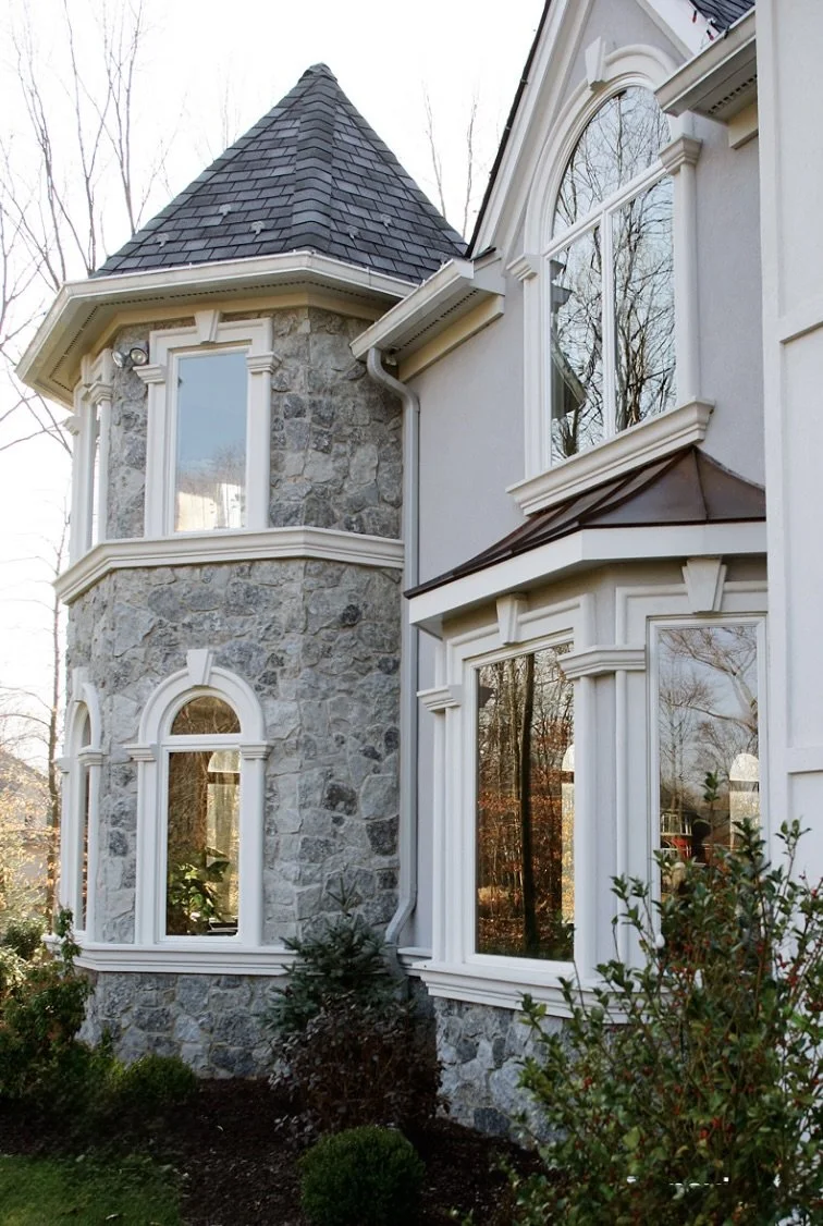 Bluewater carries the turret and bay below a copper awning, its mosaic pieces tightening around the window openings.