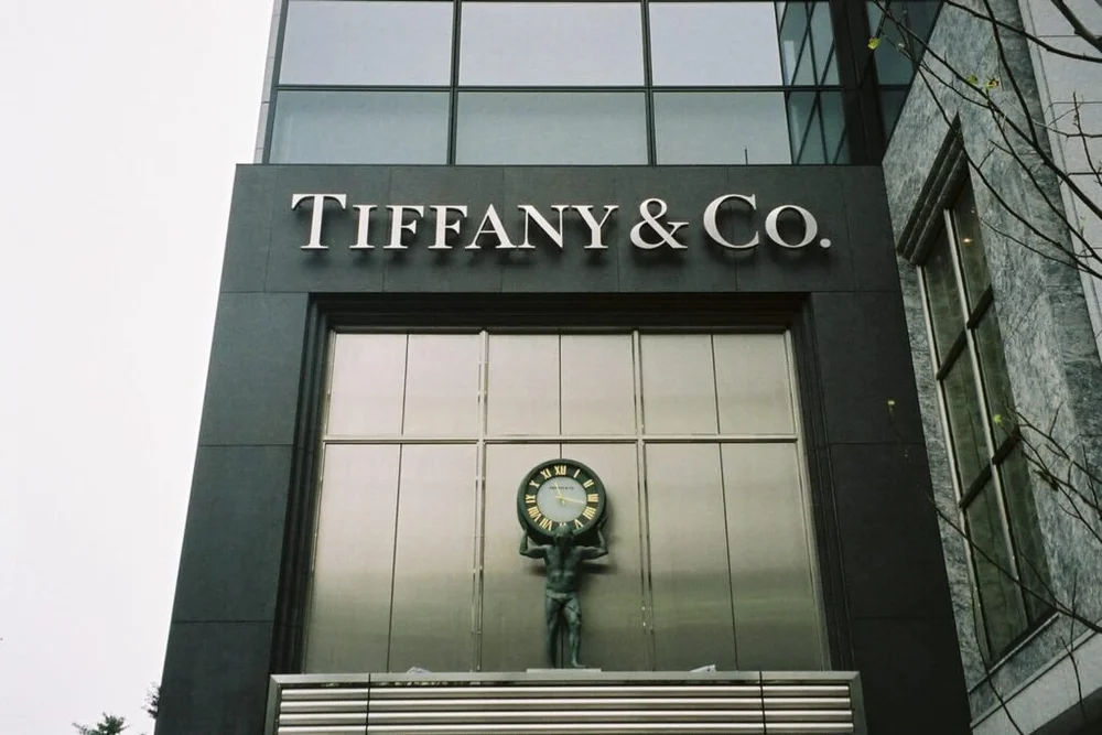 Cambrian Black in an antique face frames the Tiffany and Co display window beneath the store sign.