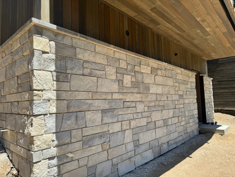 Bellevue Estate veneer and Charcoal wainscot caps on a facade.