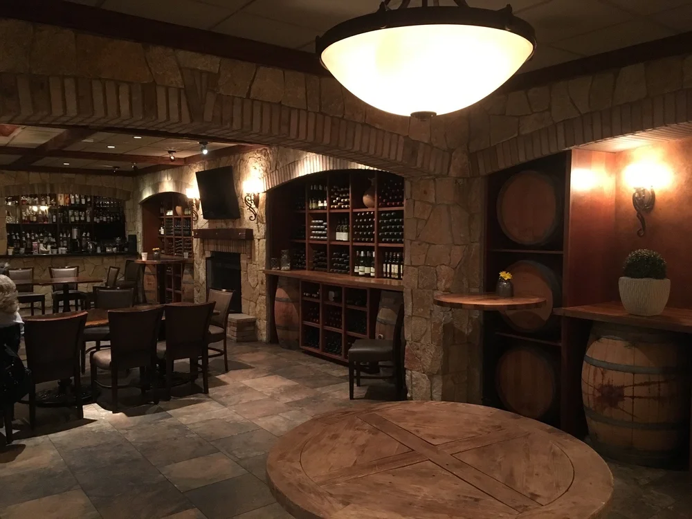 Tuscany Gold field veneer across an interior wall in split and natural faces with raked joints.