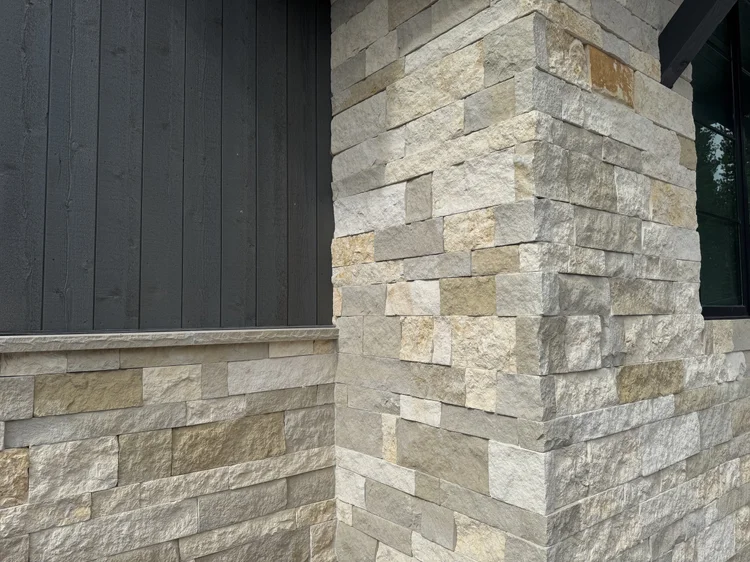 Hamptons Estate veneer and Buff wainscot caps on a facade.