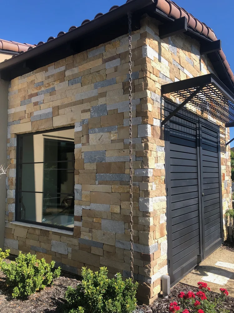 Napa Valley Estate ashlar veneer in split and natural faces with dry-stack joints on a home facade.