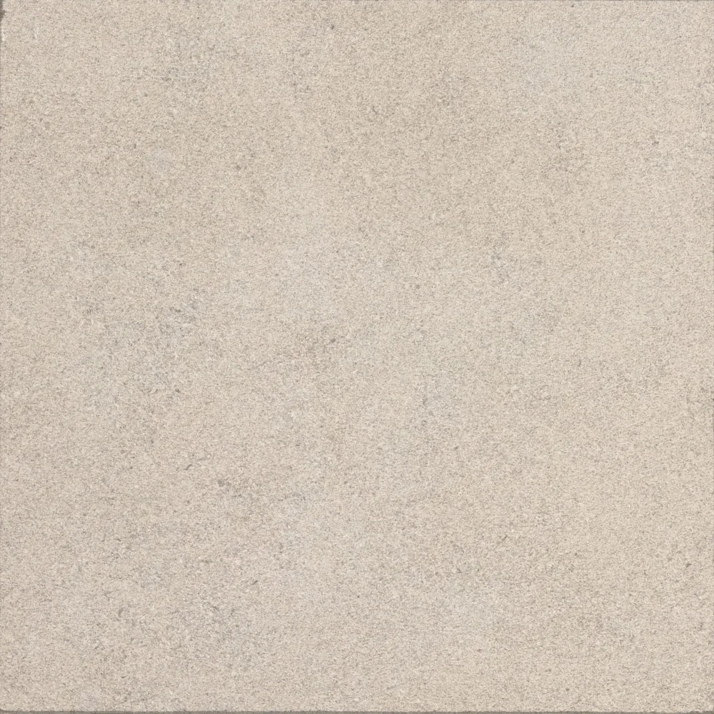 A honed Indiana Limestone Buff paver, creamy and near uniform with faint gray mottling.