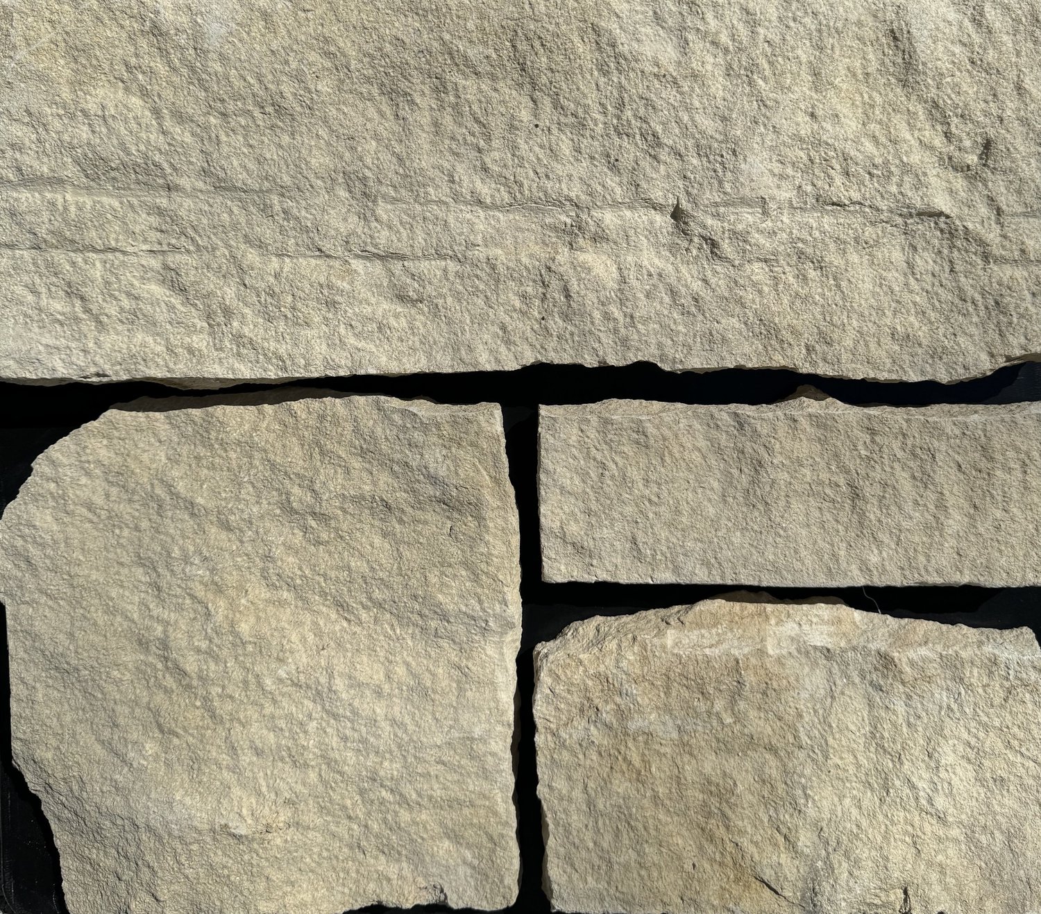 Silverdale ashlar veneer sample in split face with chopped ends.