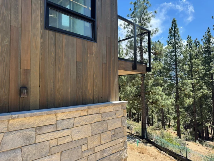 Bellevue Estate veneer and Charcoal wainscot caps on a facade.