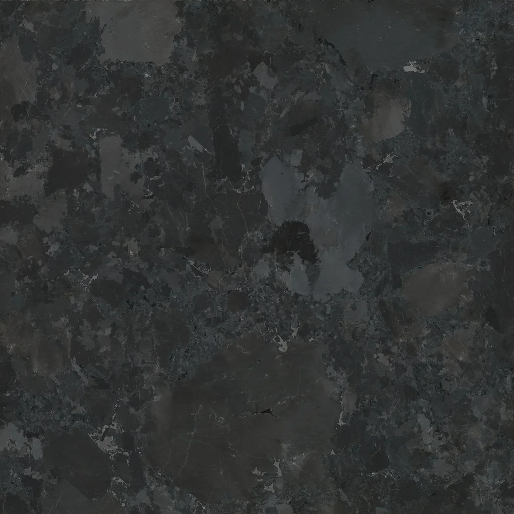 Saint Henry Black granite with a honed face and square-cut edges, matte charcoal gray with pale feldspar crystals, material reference swatch.