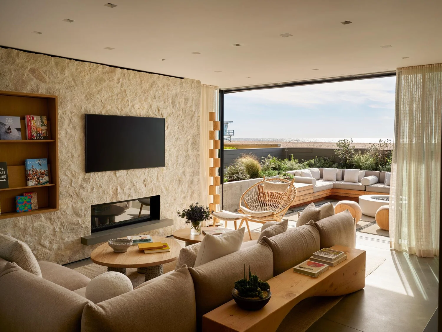 Tuscany field veneer on an interior fireplace in split and natural faces with overgrout joints.