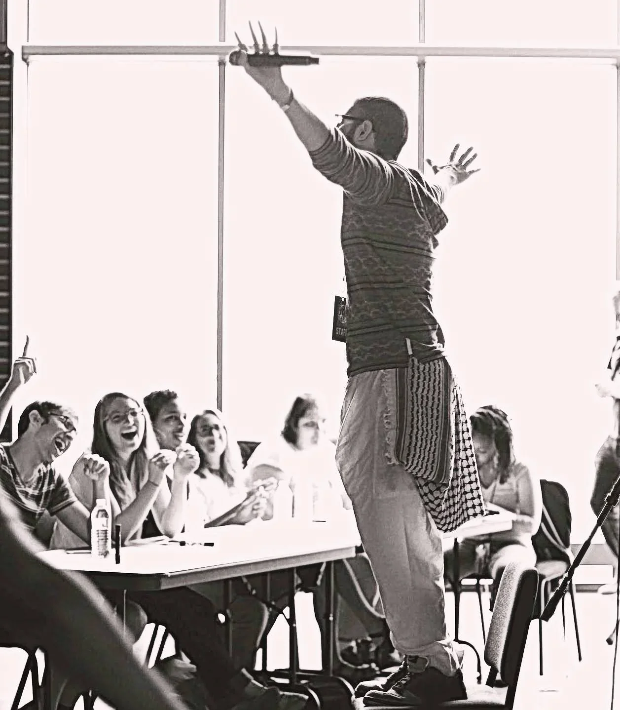 Tariq leading an open mic