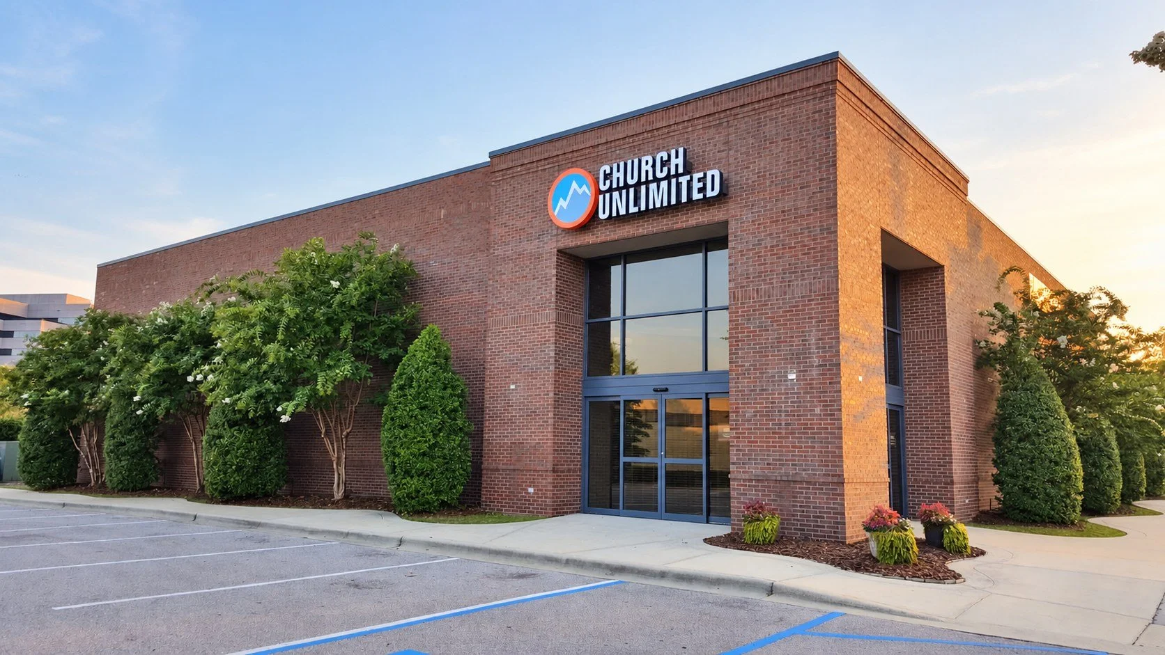 Church Unlimited building with the church sign above the entrance and parking in front