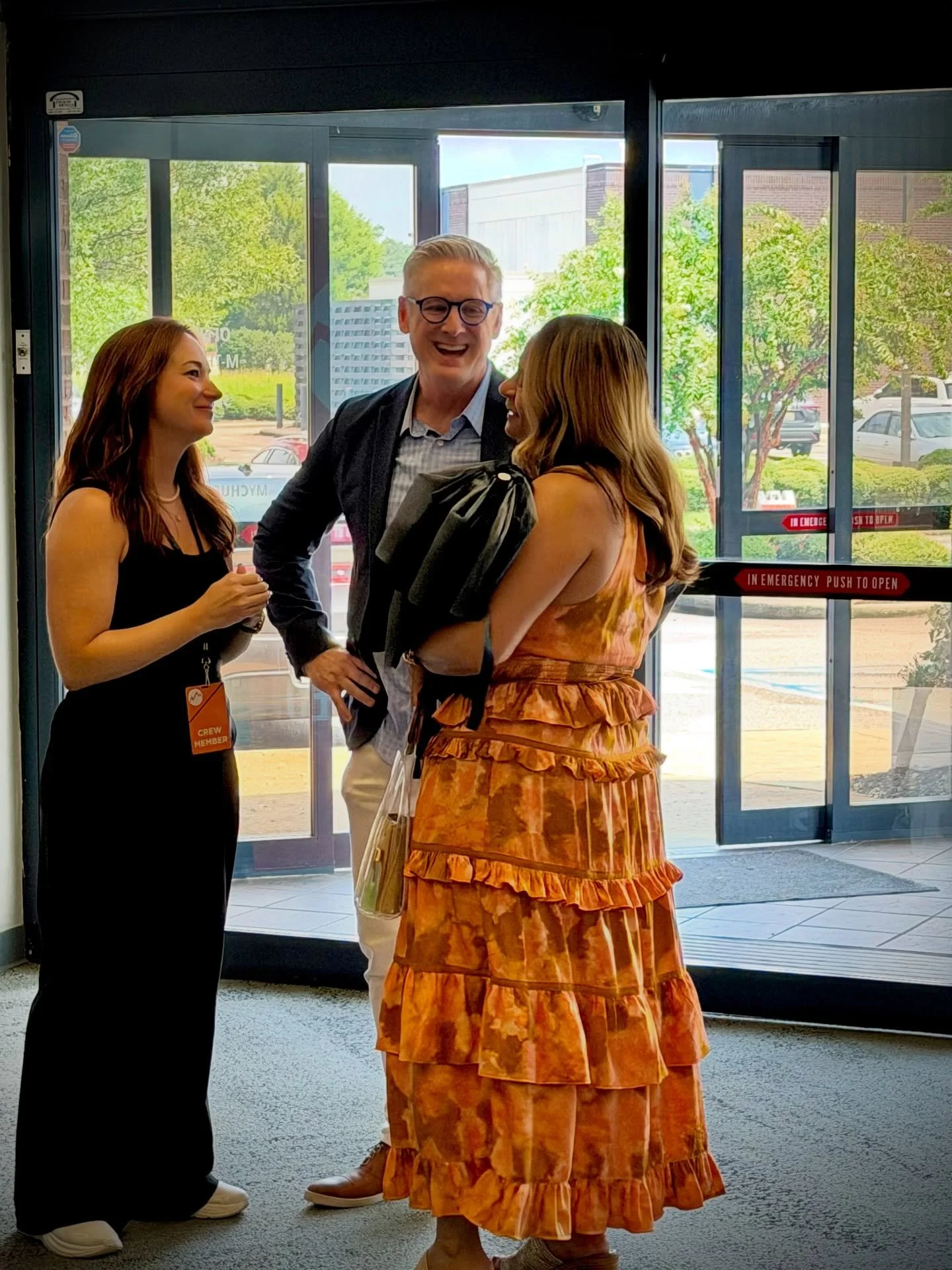 A welcoming conversation in the Church Unlimited lobby