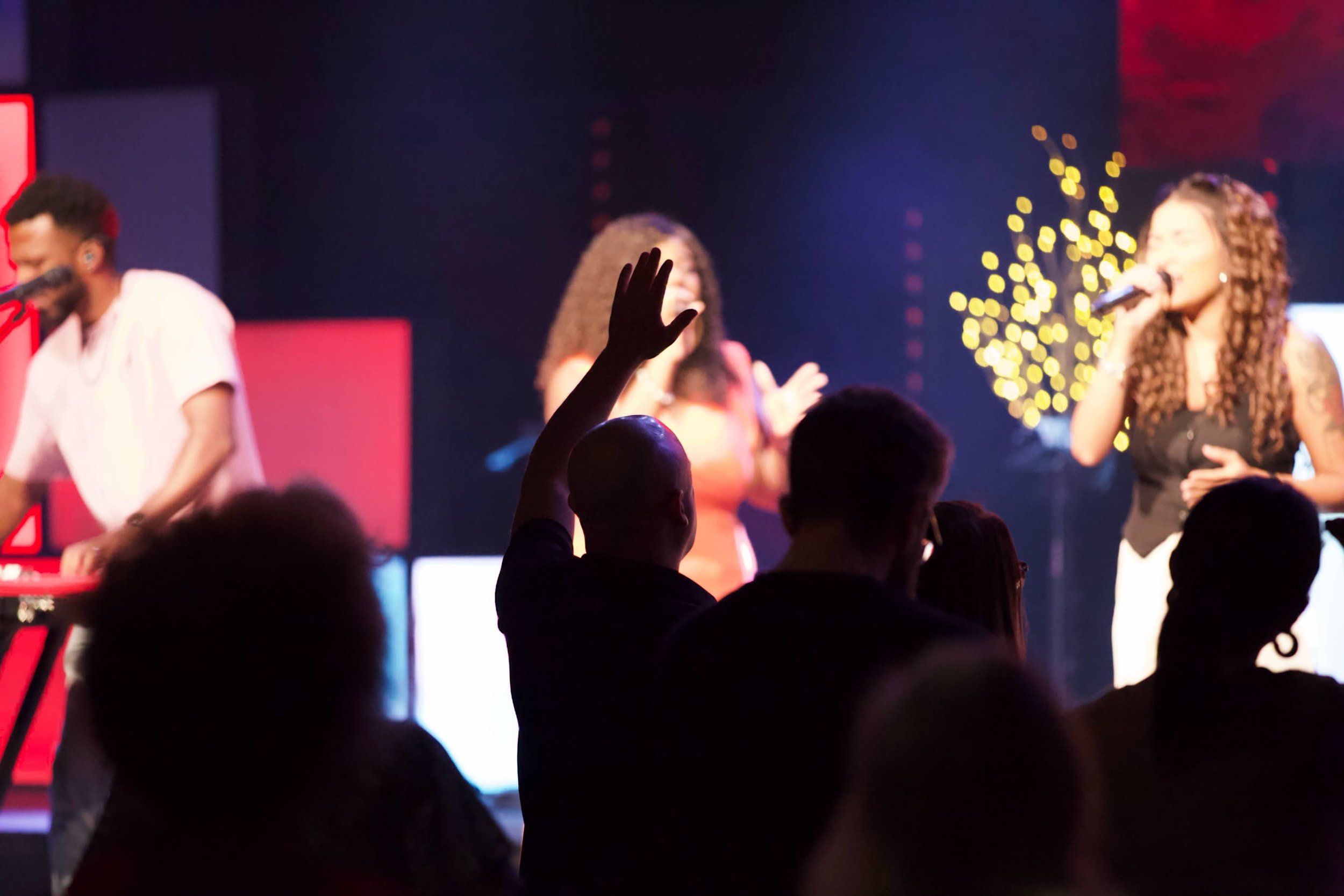 Congregation worshipping together at Church Unlimited