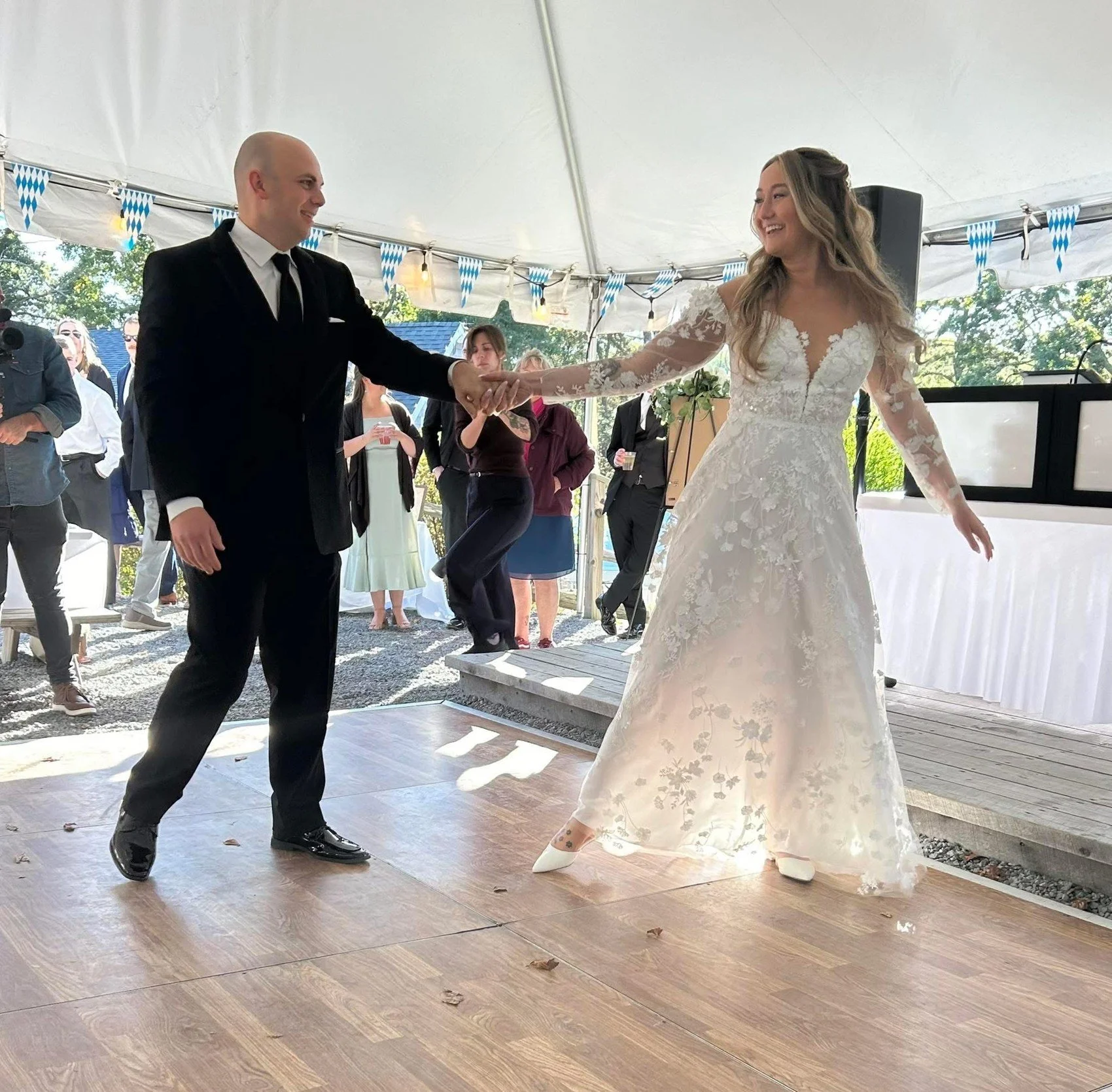 A couple dancing beneath the tent at Naukabout