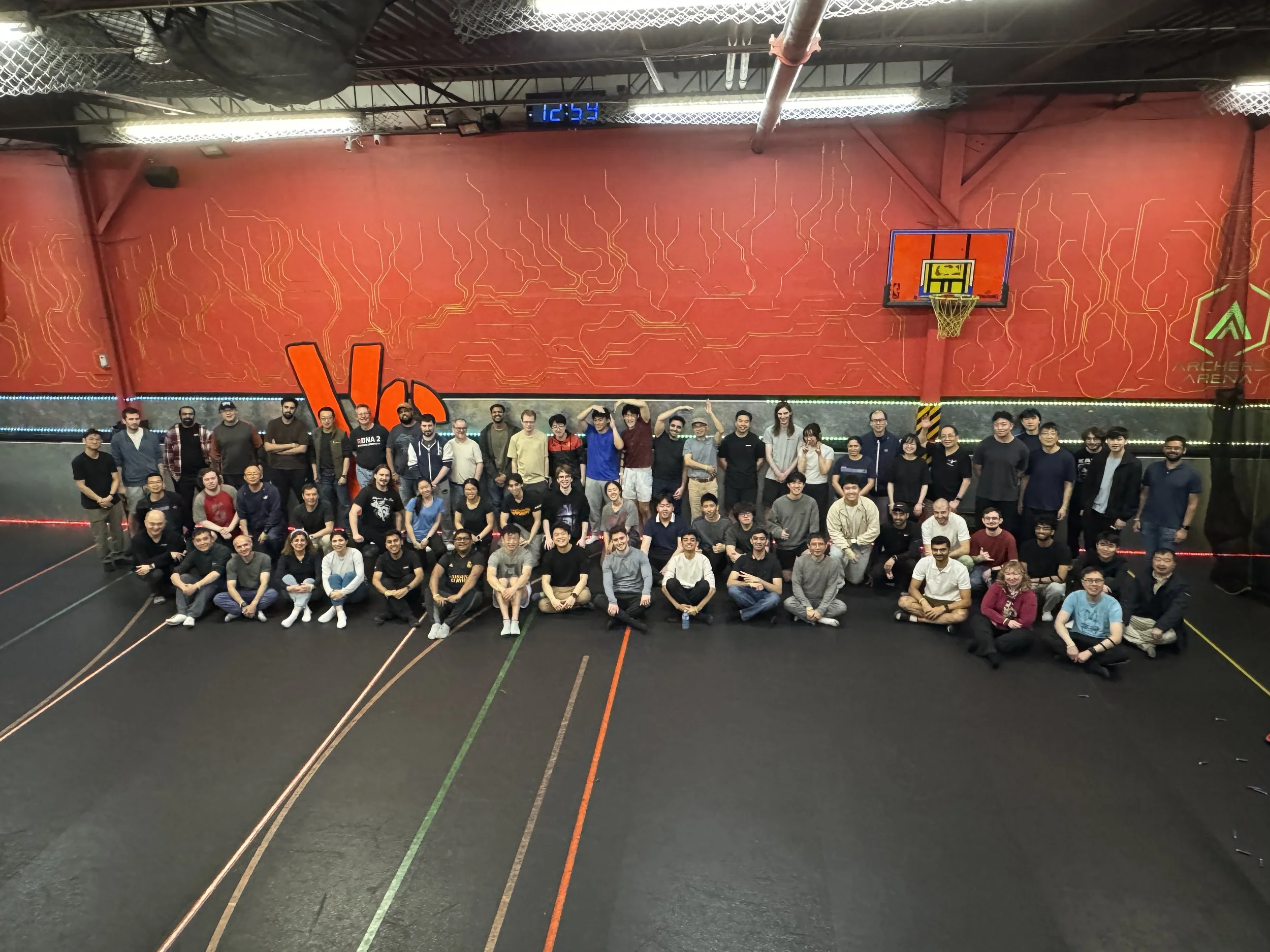 Group of corporate teammates enjoying activities at Archers Arena