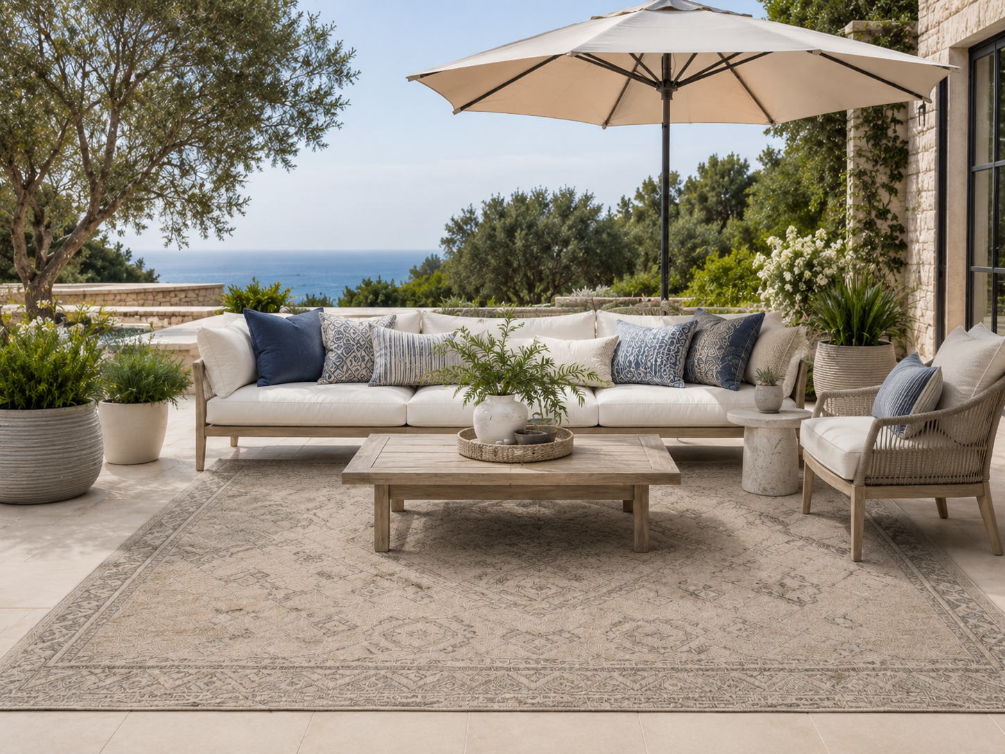 Outdoor patio rug with umbrella and seating