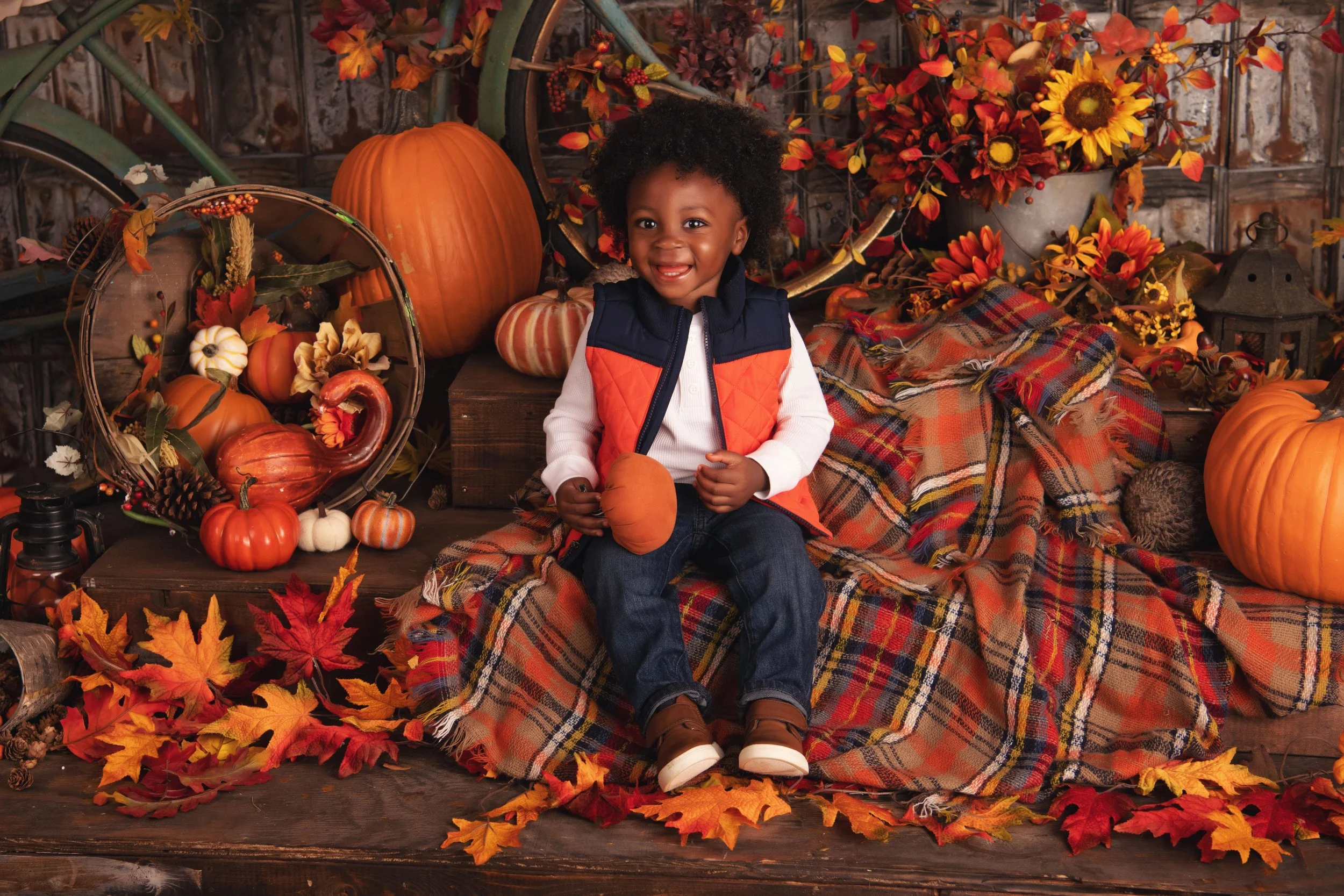 Children enjoying the Pumpkin Patch Limited-Edition Portrait Experience