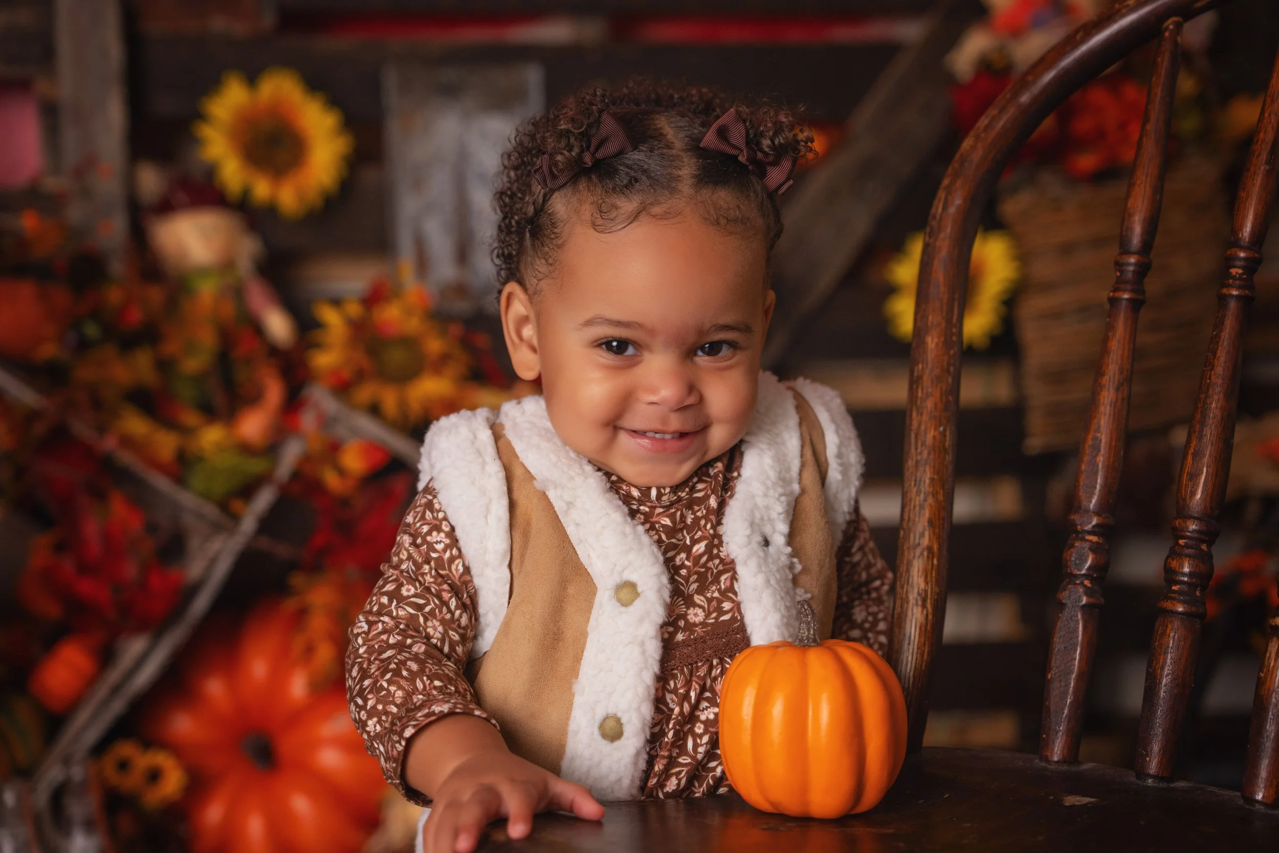 Natural child portrait in a fall studio set