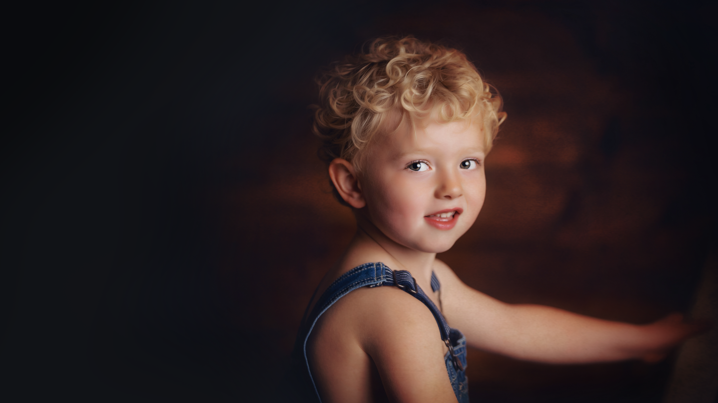 Young child photographed in the studio by Matt and Shea Photography