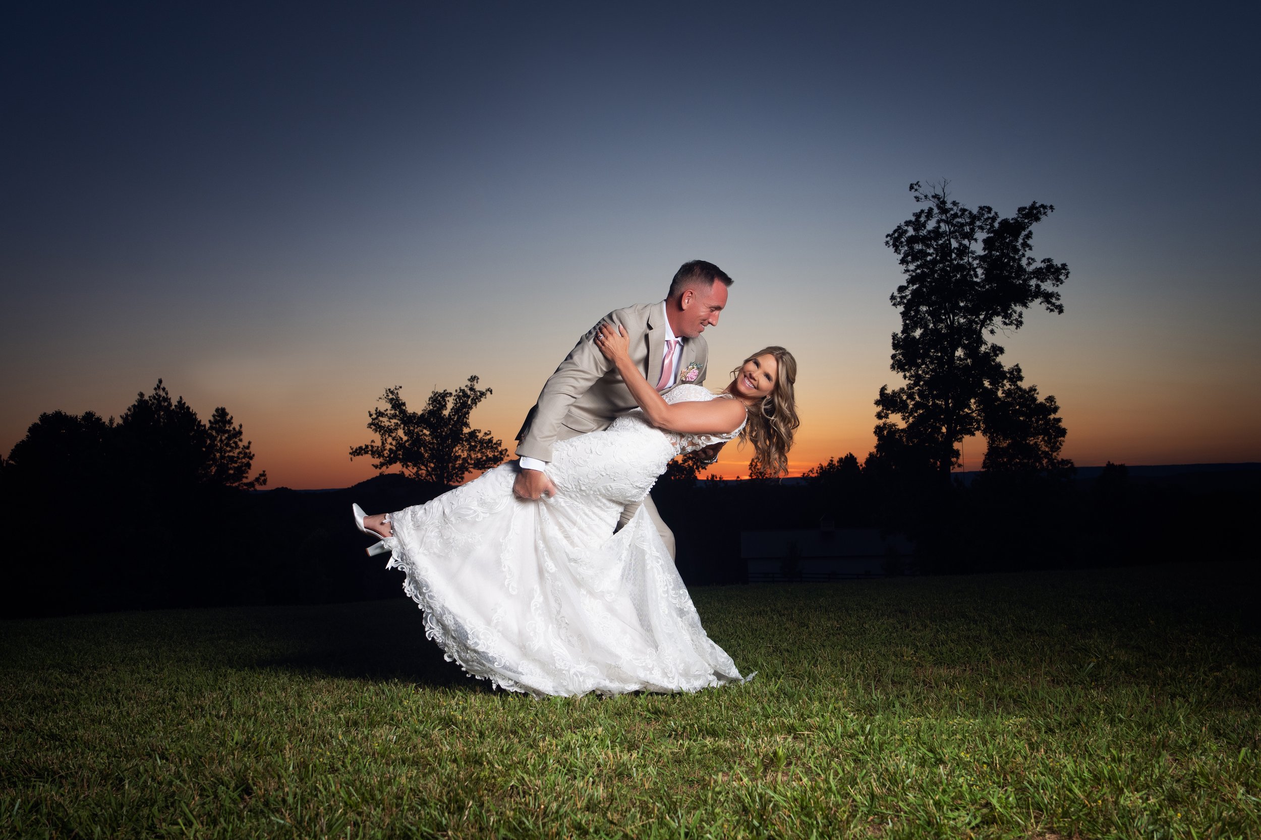 Bride and groom celebrating at sunset during their Chattanooga wedding