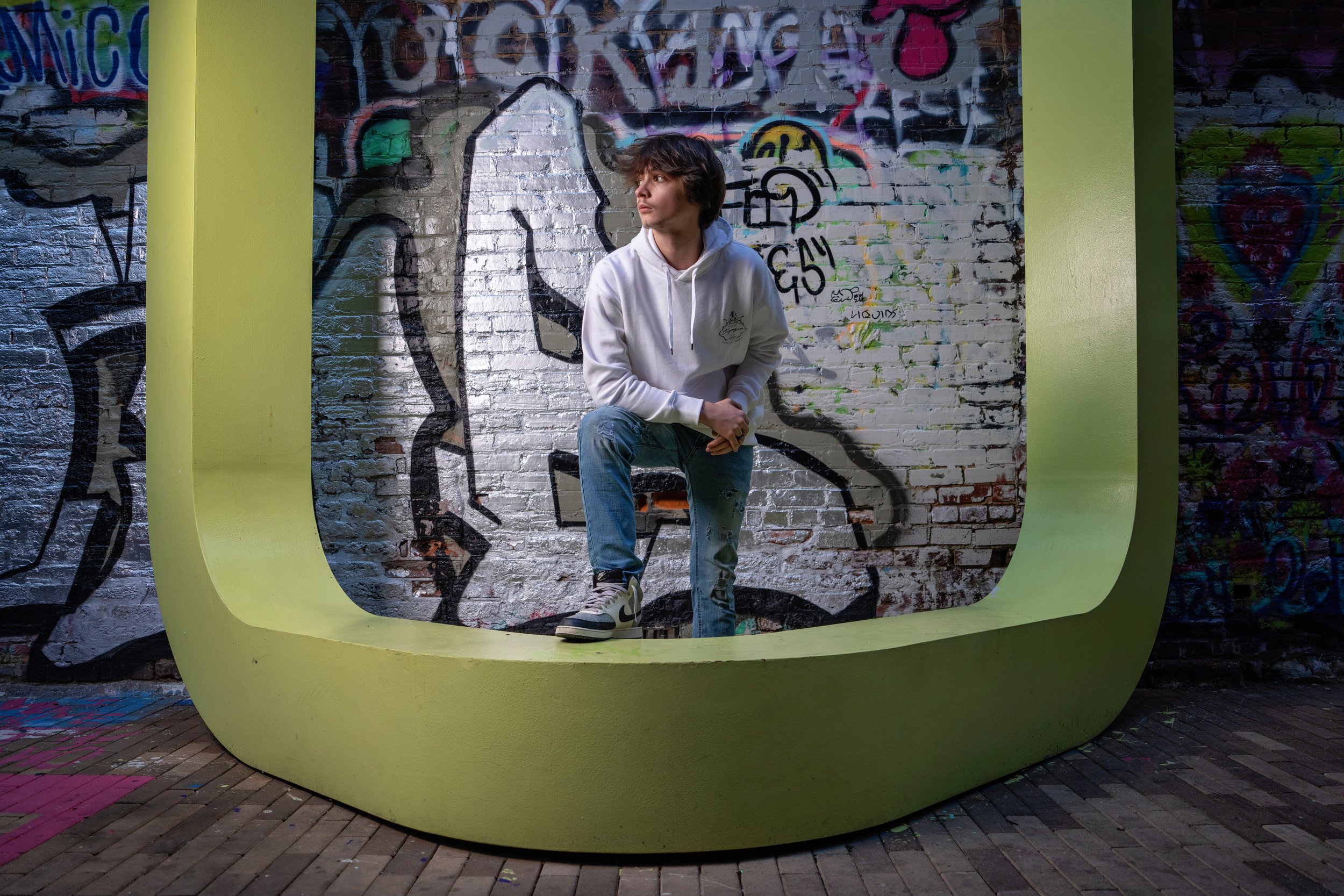 Chattanooga senior guy portrait photographed at a colorful graffiti location