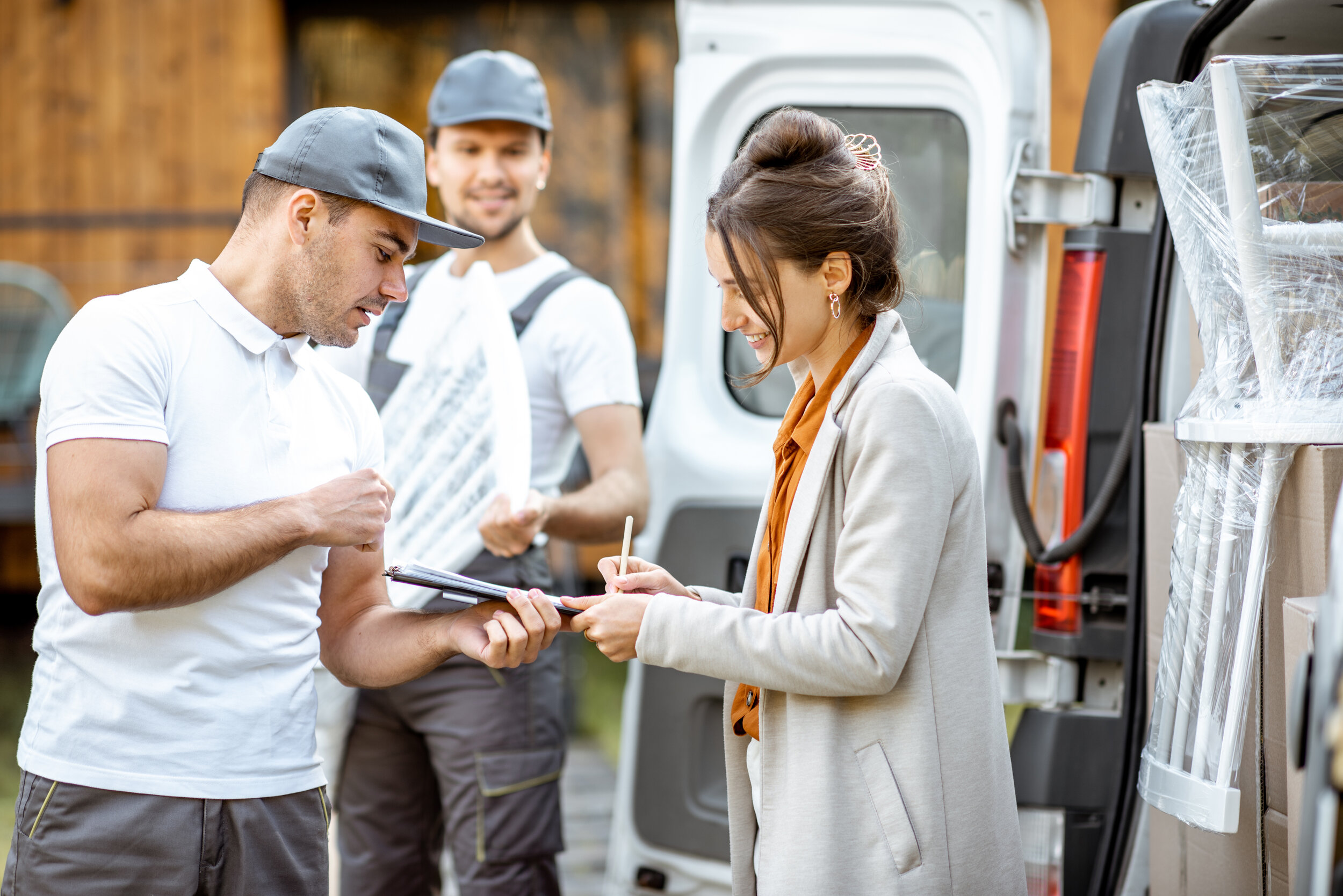 Professional vendor manager coordinating home maintenance services