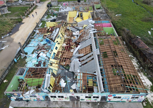 A picture of the Loving Care's School logo or crest