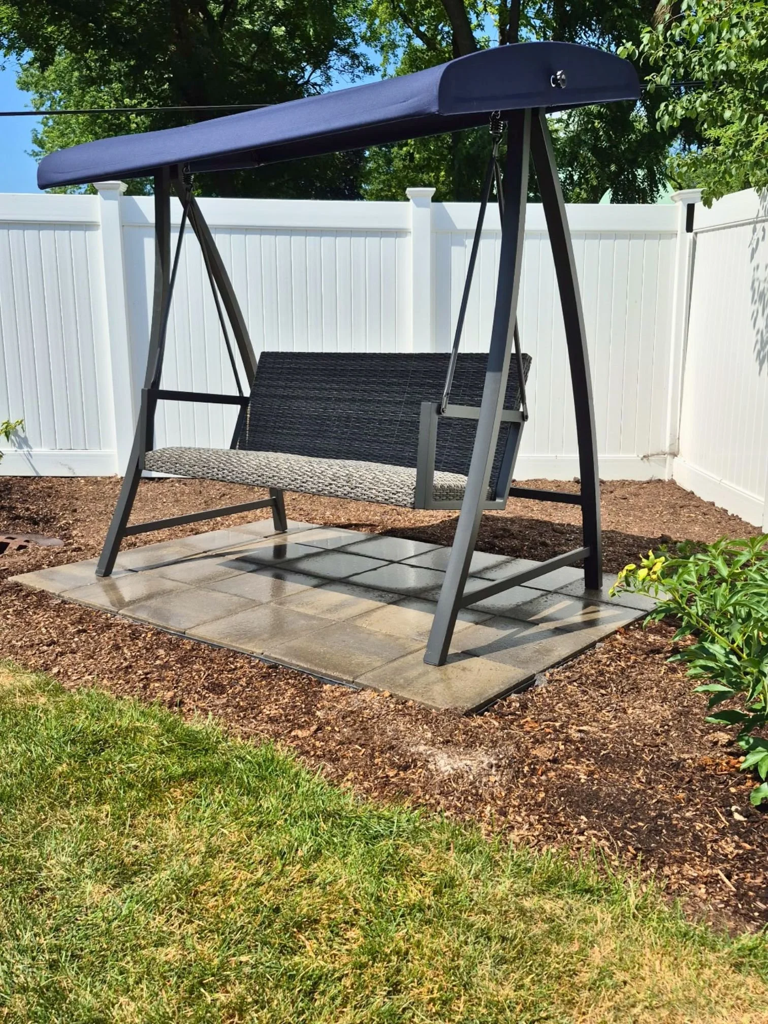 Concrete patio pad swing in Roselle, Illinois.