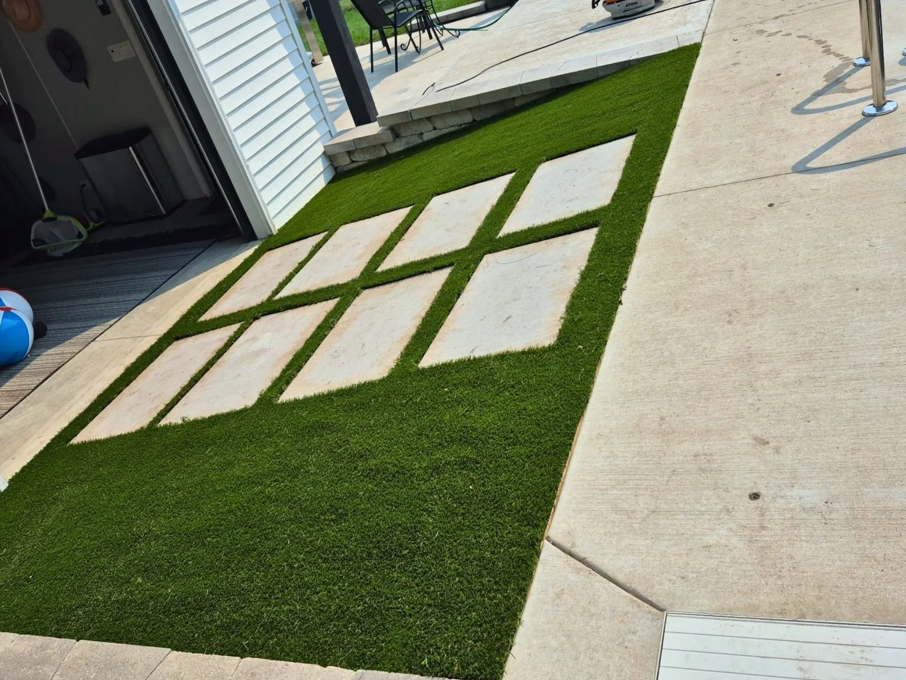 Wide view of artificial turf paver grid in Roselle, Illinois.