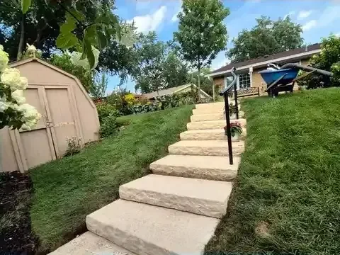 Wide view of the concrete stair extension and handrail in Schaumburg, Illinois.