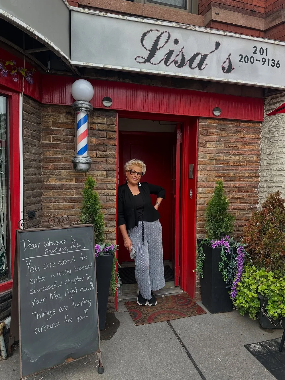 Lisa outside Lisa's Hair Zone on Bergen Avenue