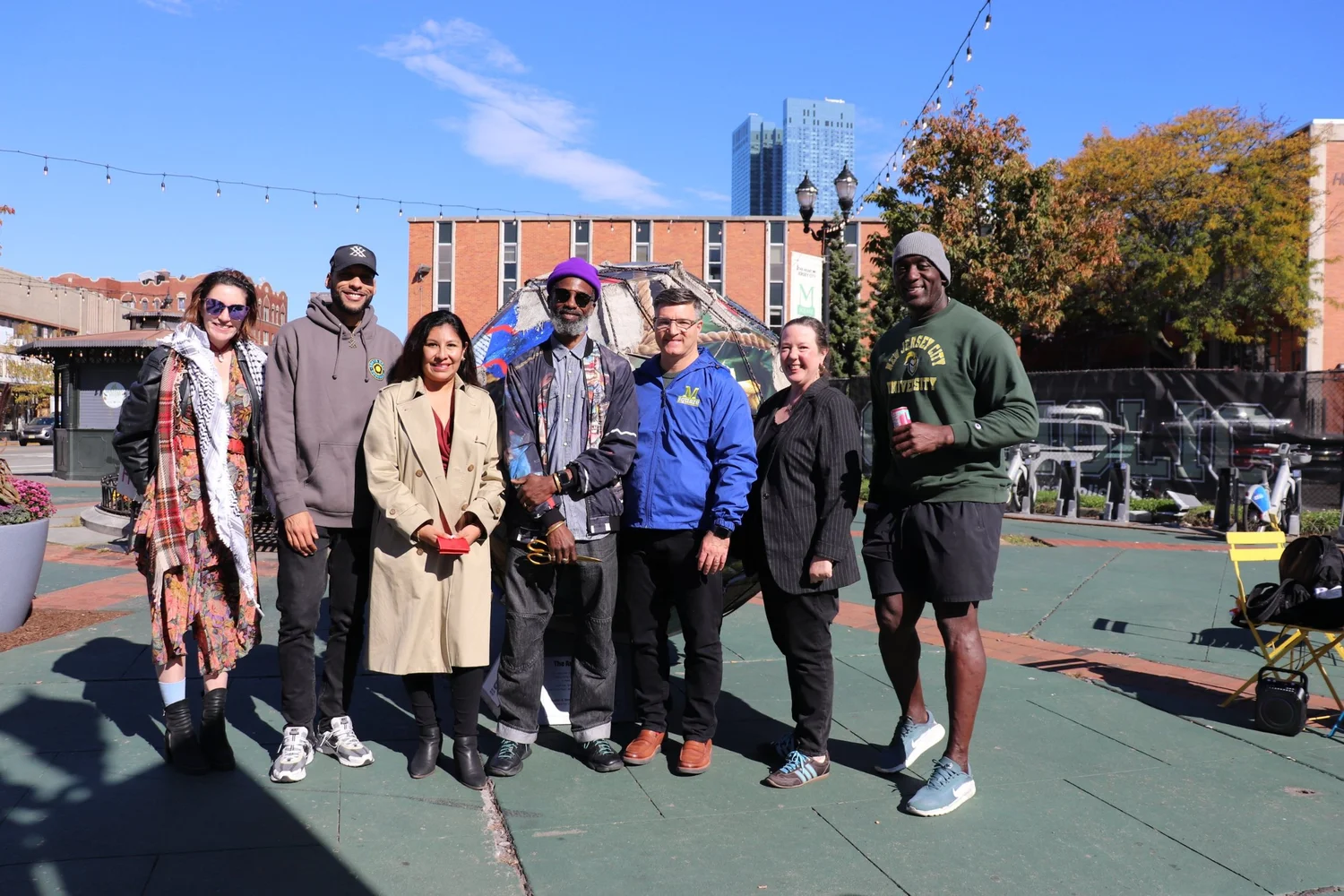 Partners gathered at the sculpture dedication