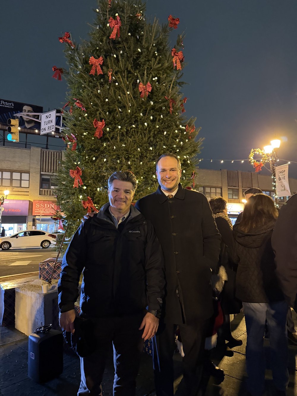 Chris Bernardo with Jersey City Mayor James Solomon at the tree lighting