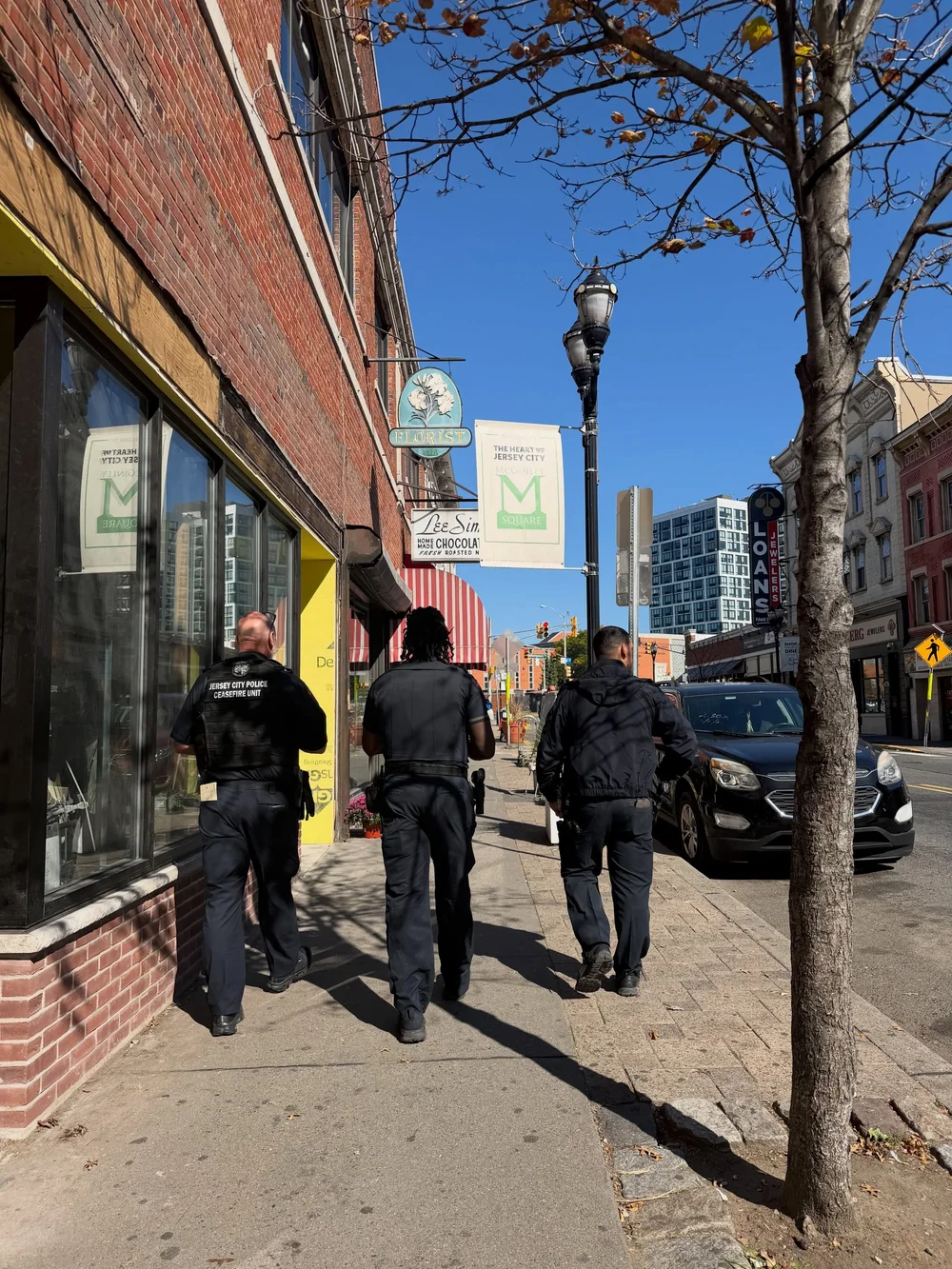 Officers patrolling McGinley Square