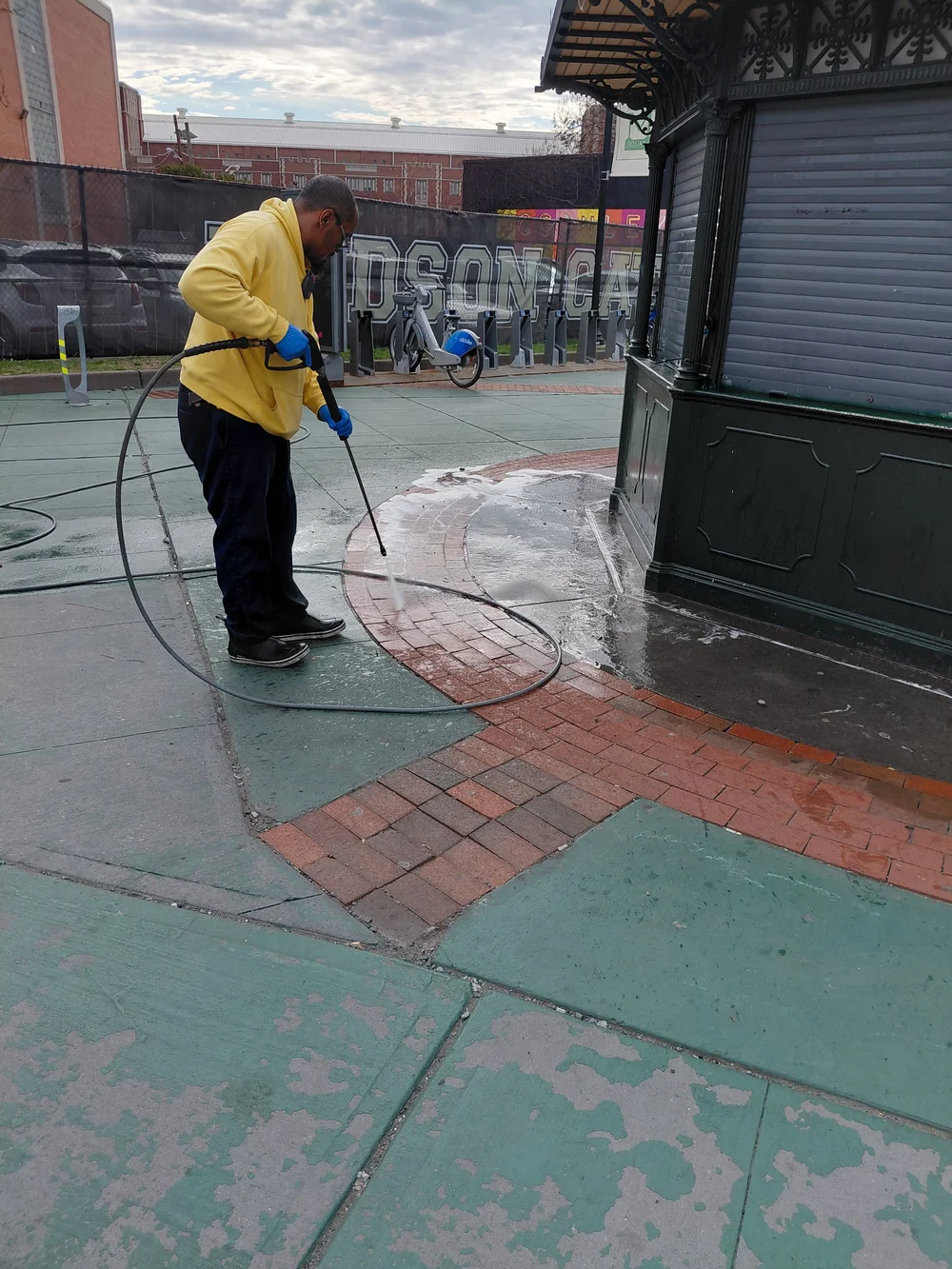 CDS crew power washing the McGinley Square plaza