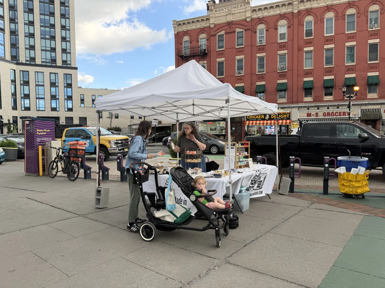 Families shopping at the McGinley Square Harvest Market