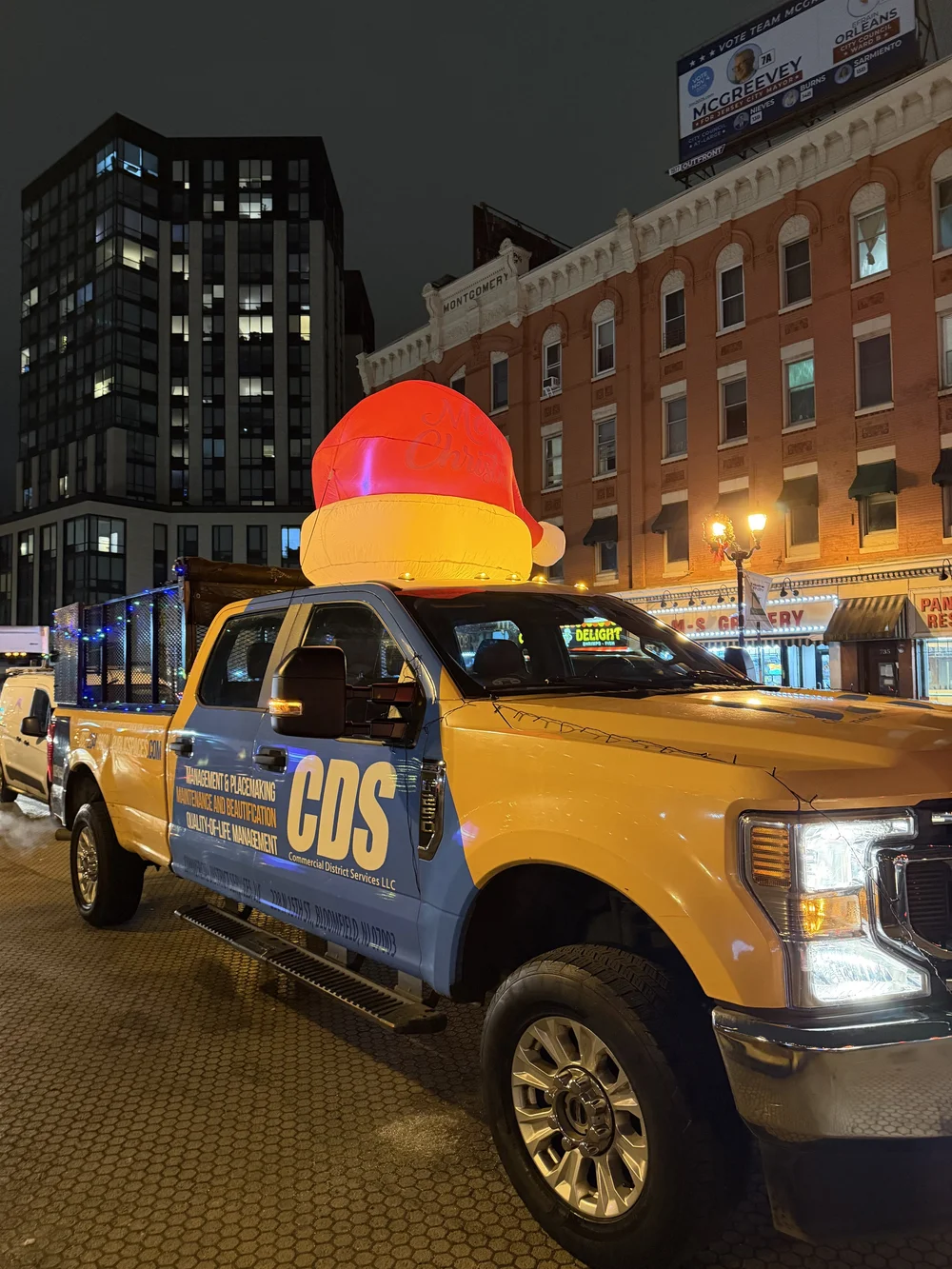 The CDS truck in McGinley Square at night