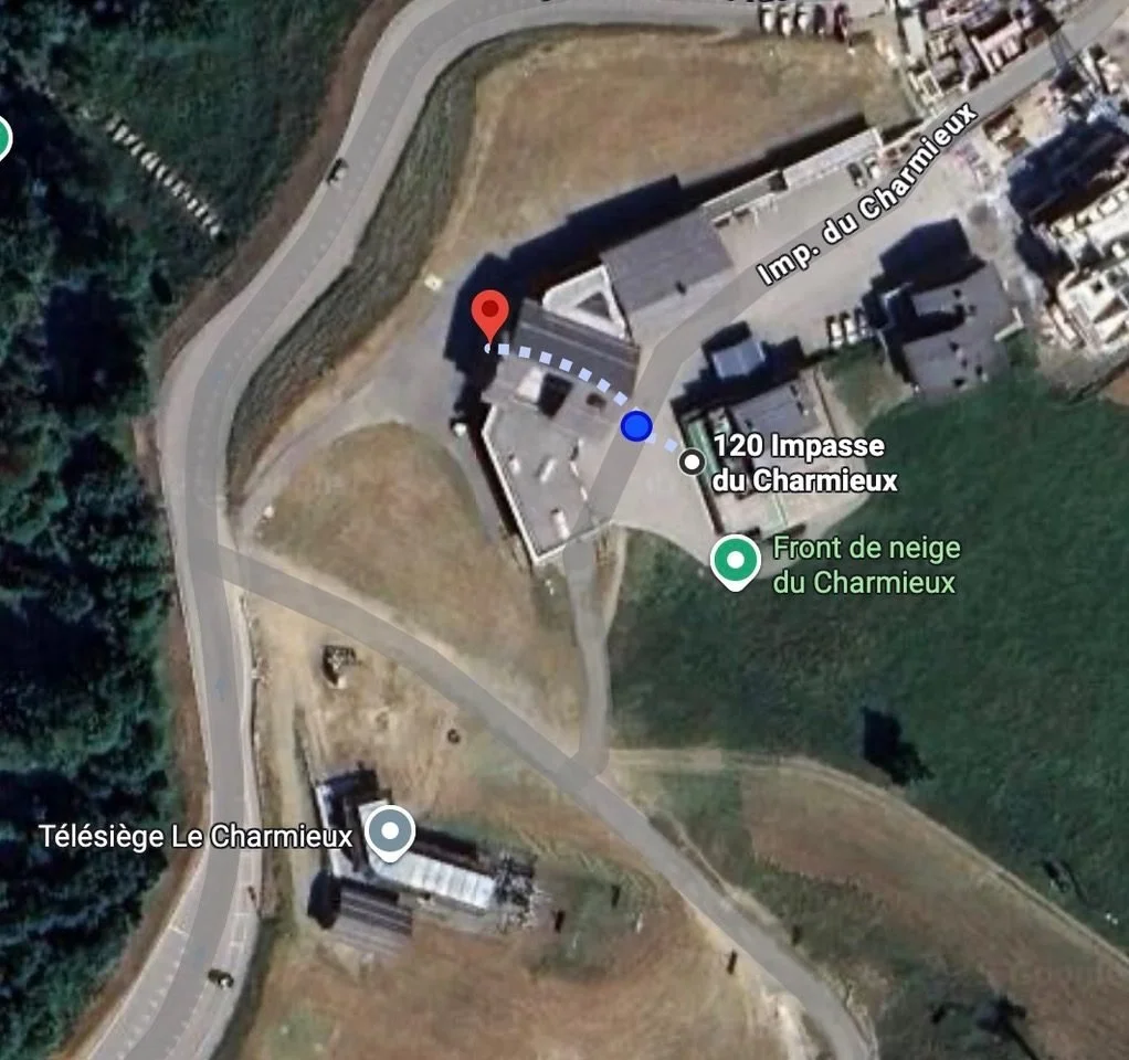 Aerial view of Ski Service, the ski-pass office and the Charmieux chairlift
