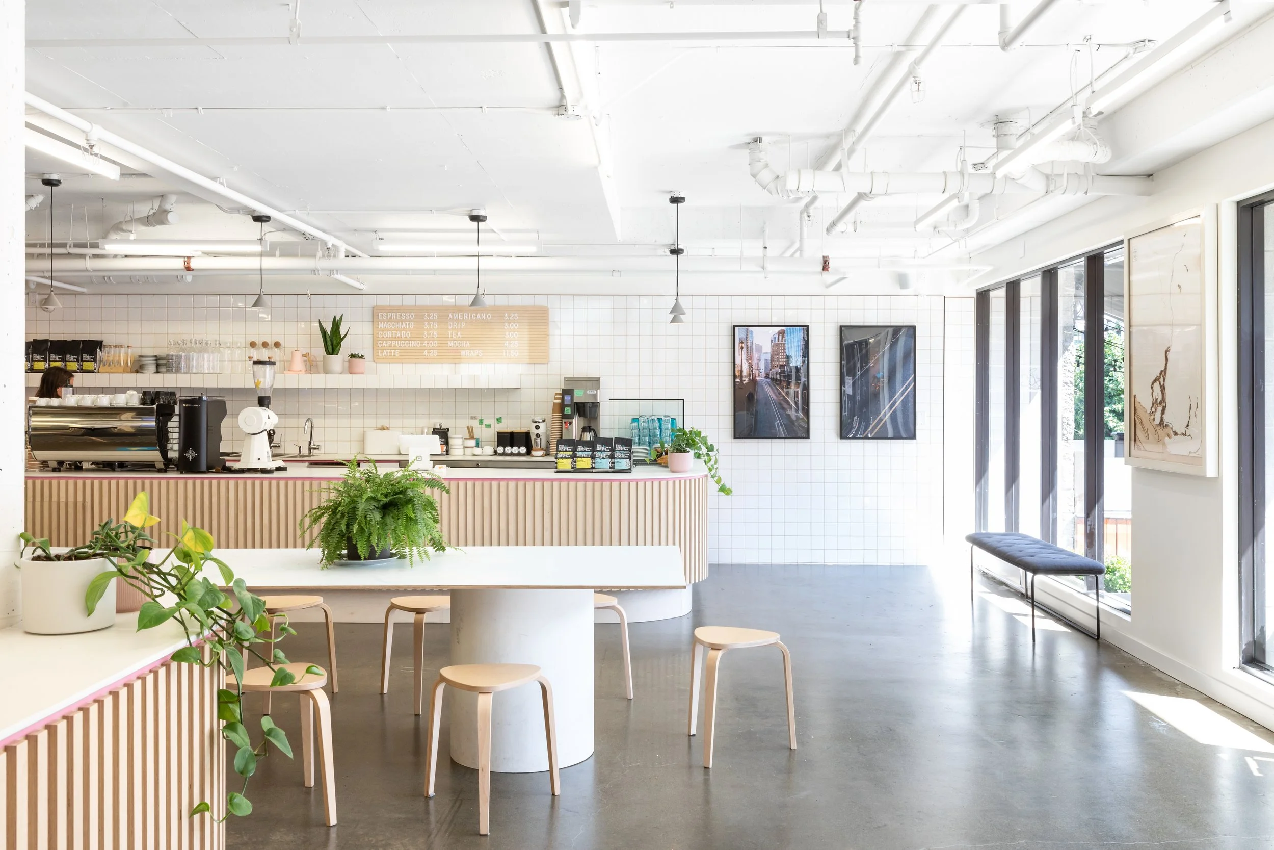 Enroute Coffee by Campos Studio, café and bike shop interior in Vancouver, BC